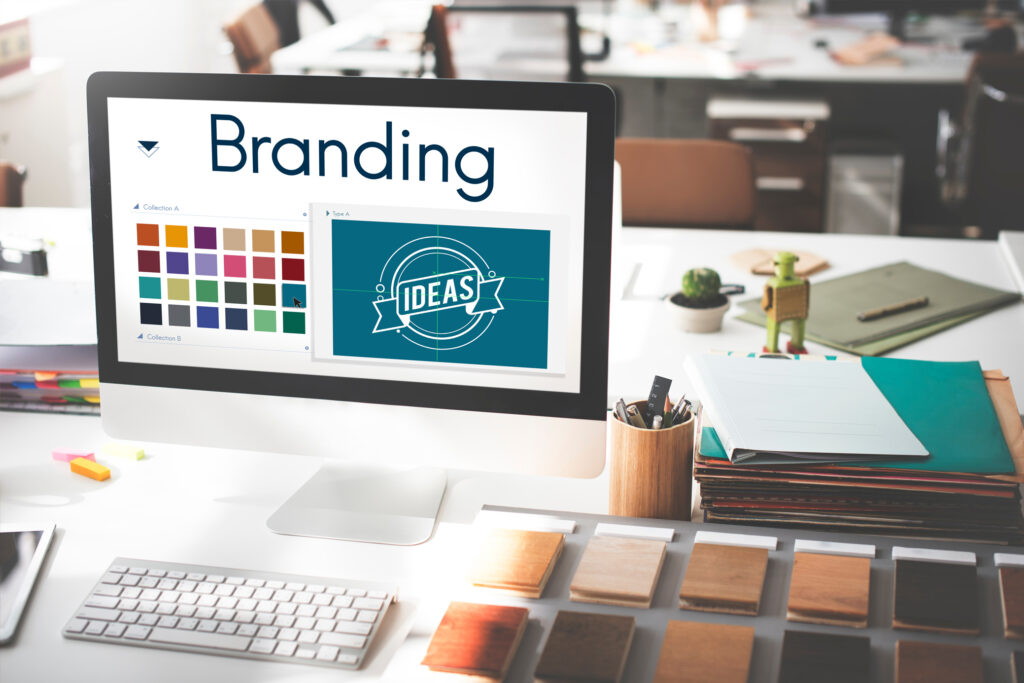 Monitor displaying various branding ideas for design identity and marketing concept.